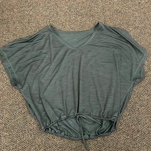 Lululemon Size 2, Cropped Baggy Dark Green/Blue T-Shirt.